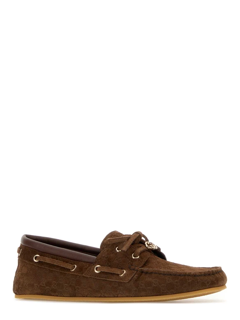 LEATHER UPPER AND RUBBER SOLE MOCCASIN