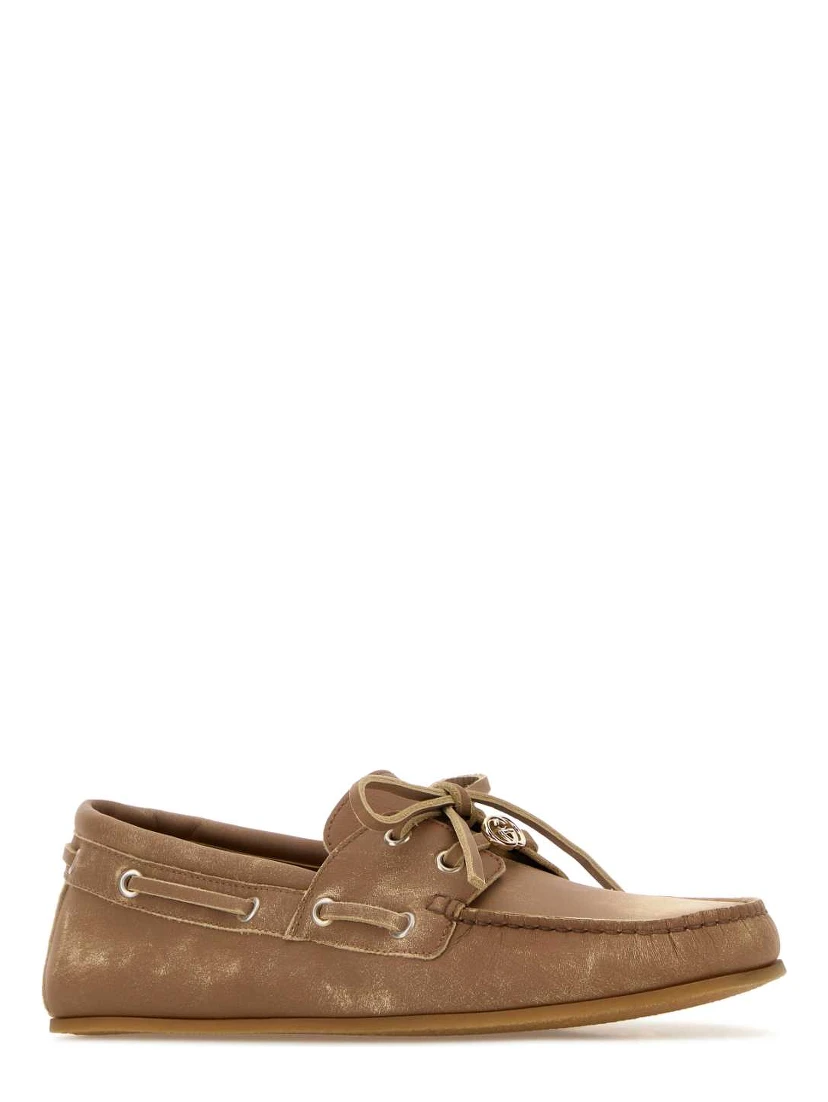 LEATHER UPPER AND RUBBER SOLE MOCCASIN