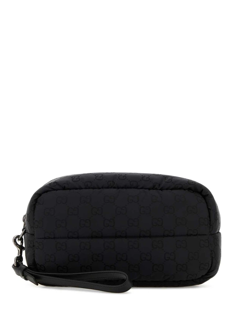 POUCH WITH REMOVABLE HANDLE