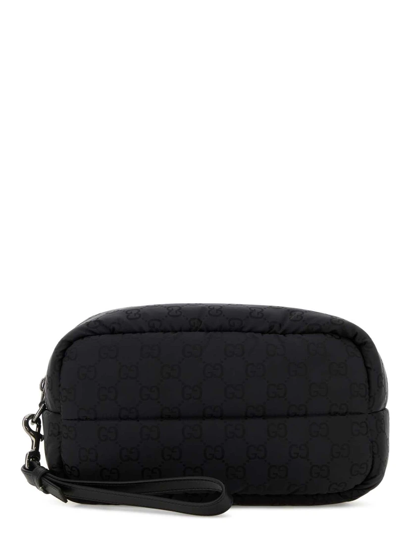 POUCH WITH REMOVABLE HANDLE