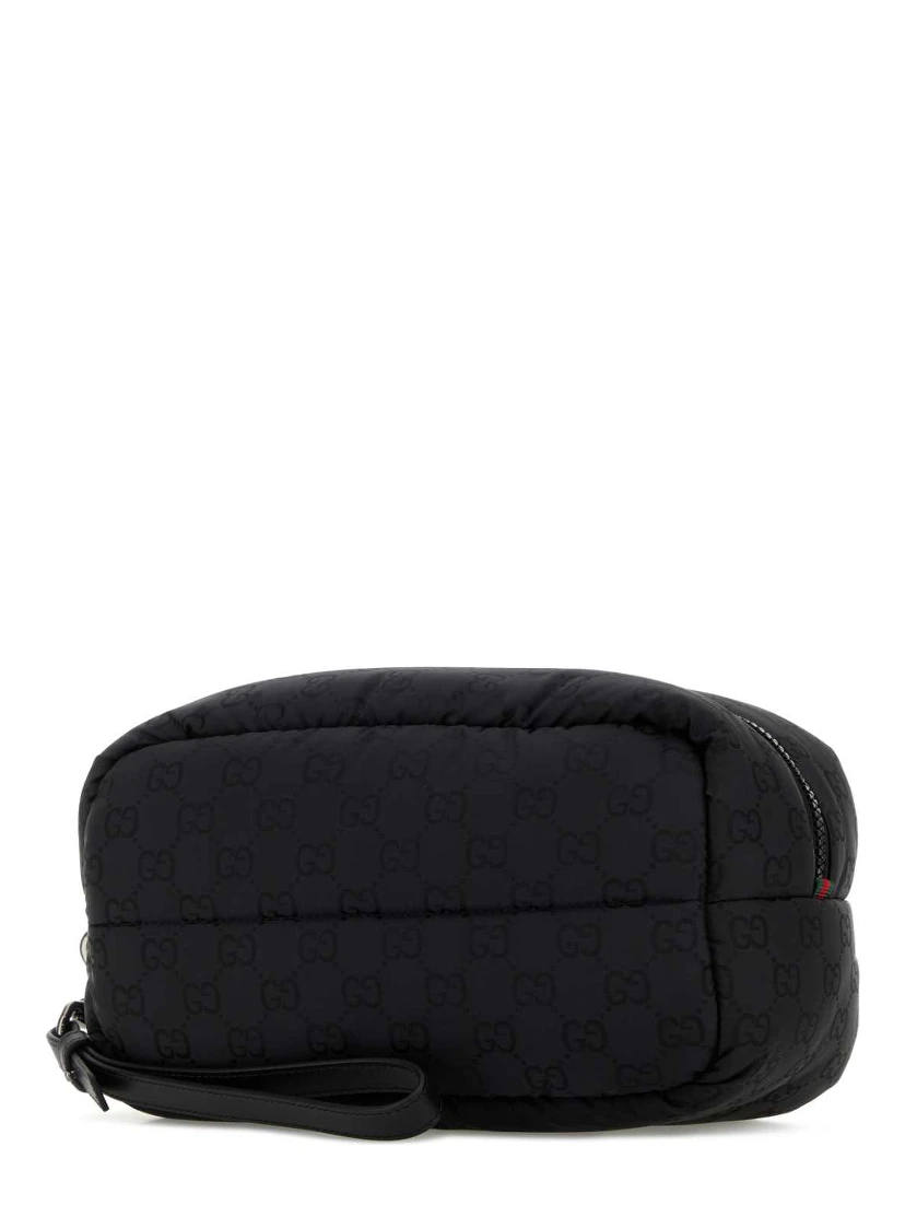 POUCH WITH REMOVABLE HANDLE