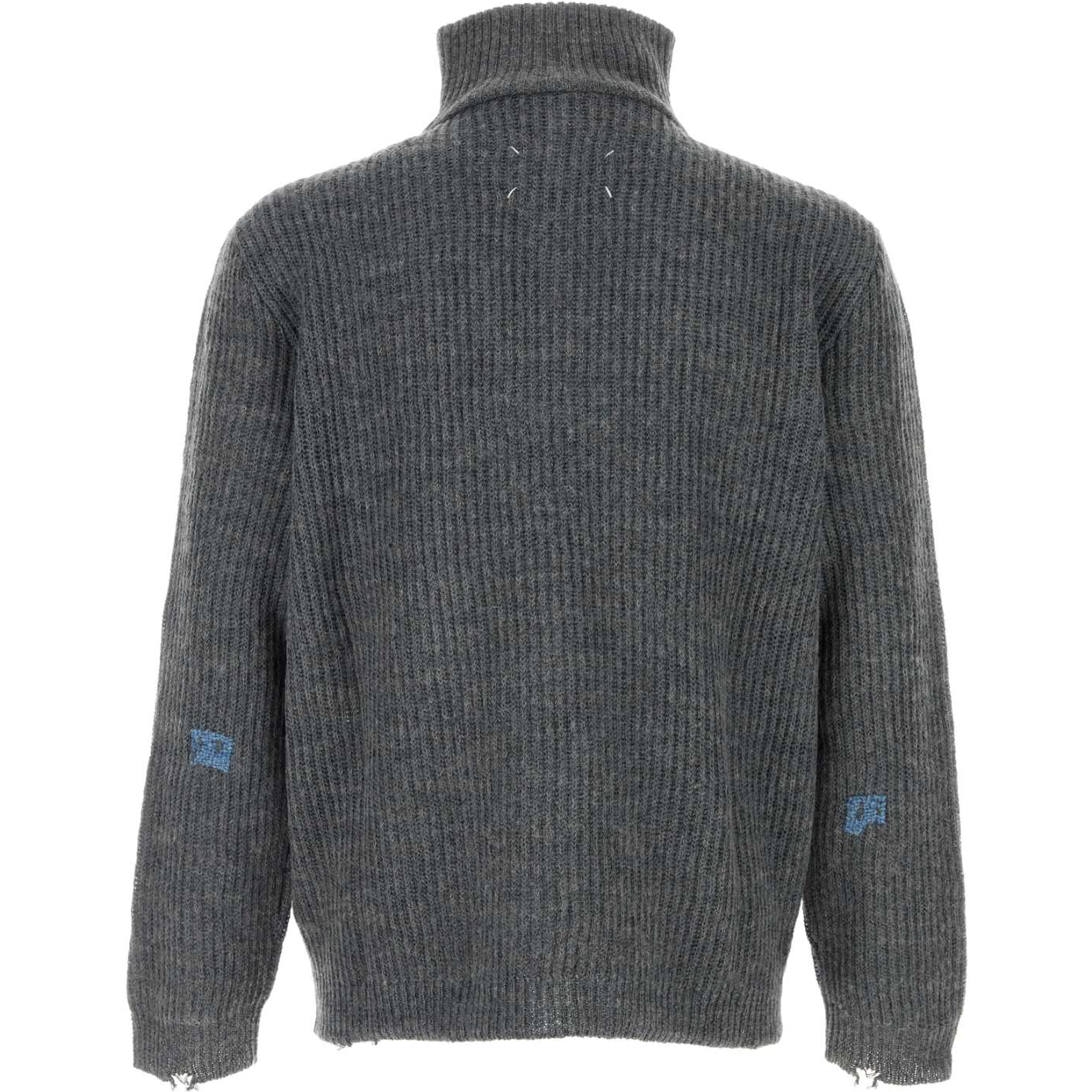 MENDED RIBBED SWEATER