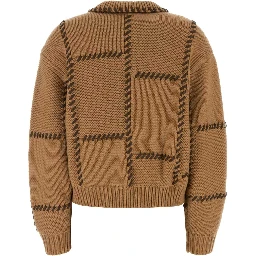 THE LEATHER STITCH SWEATER