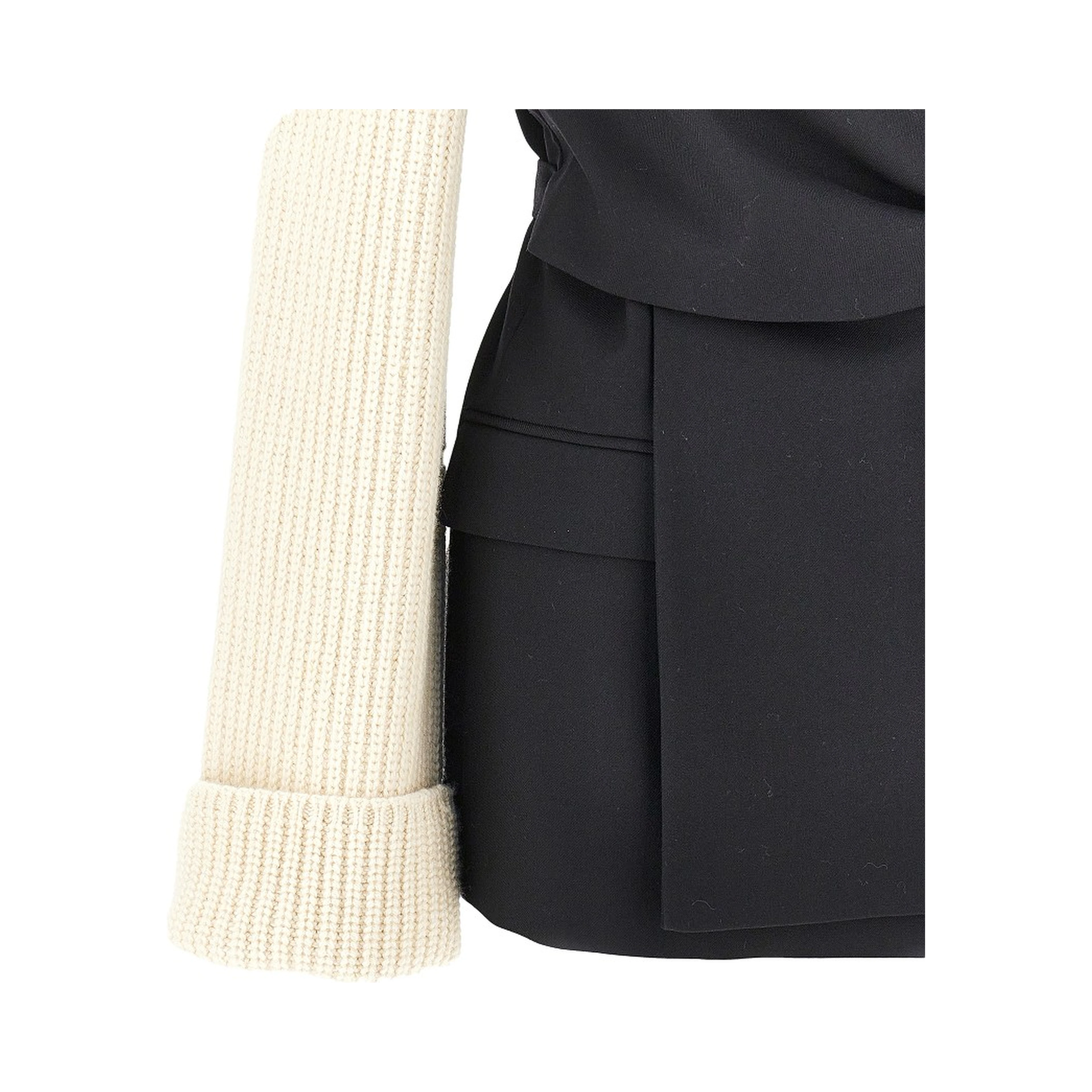 Wool blazer with knitted sleeves