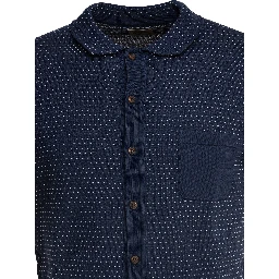 Textured knit polo shirt buttons