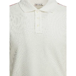 Polo shirt with buttons and logo