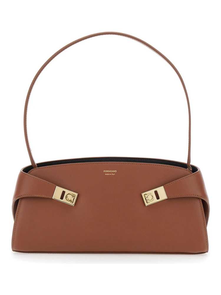 Hug East West Brown Shoulder bag with shoulder strap and straps on the front in leather for women
