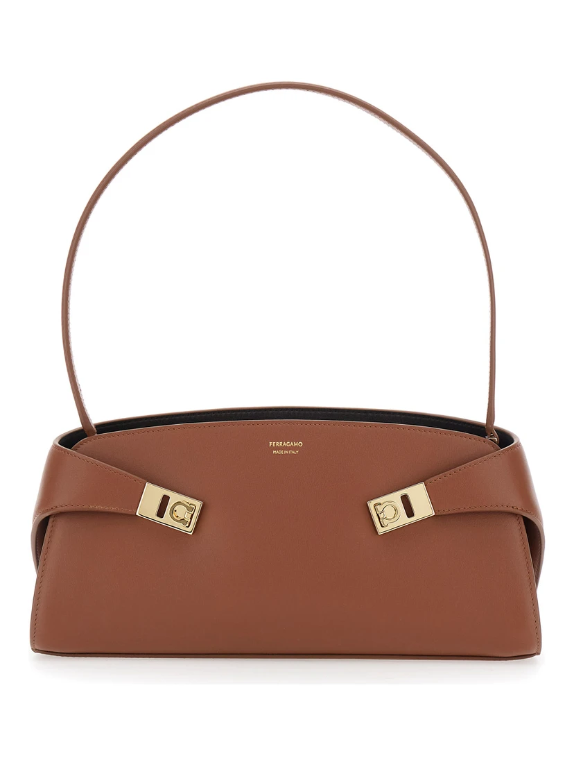Hug East West Brown Shoulder bag with shoulder strap and straps on the front in leather for women