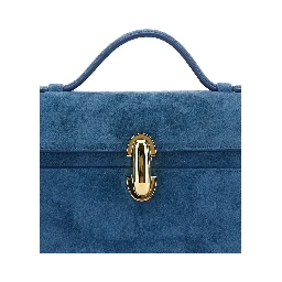 SYMMETRY CLUTCH IN SUEDE with elegant details and blue unisex suede