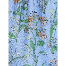 Light blue Shorts with elasticated waist and drawstring and all-over floral print in silk for women
