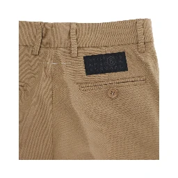 Brown Pants with welt pockets on the front and back and logo patch on the back in stretch wool blend boy