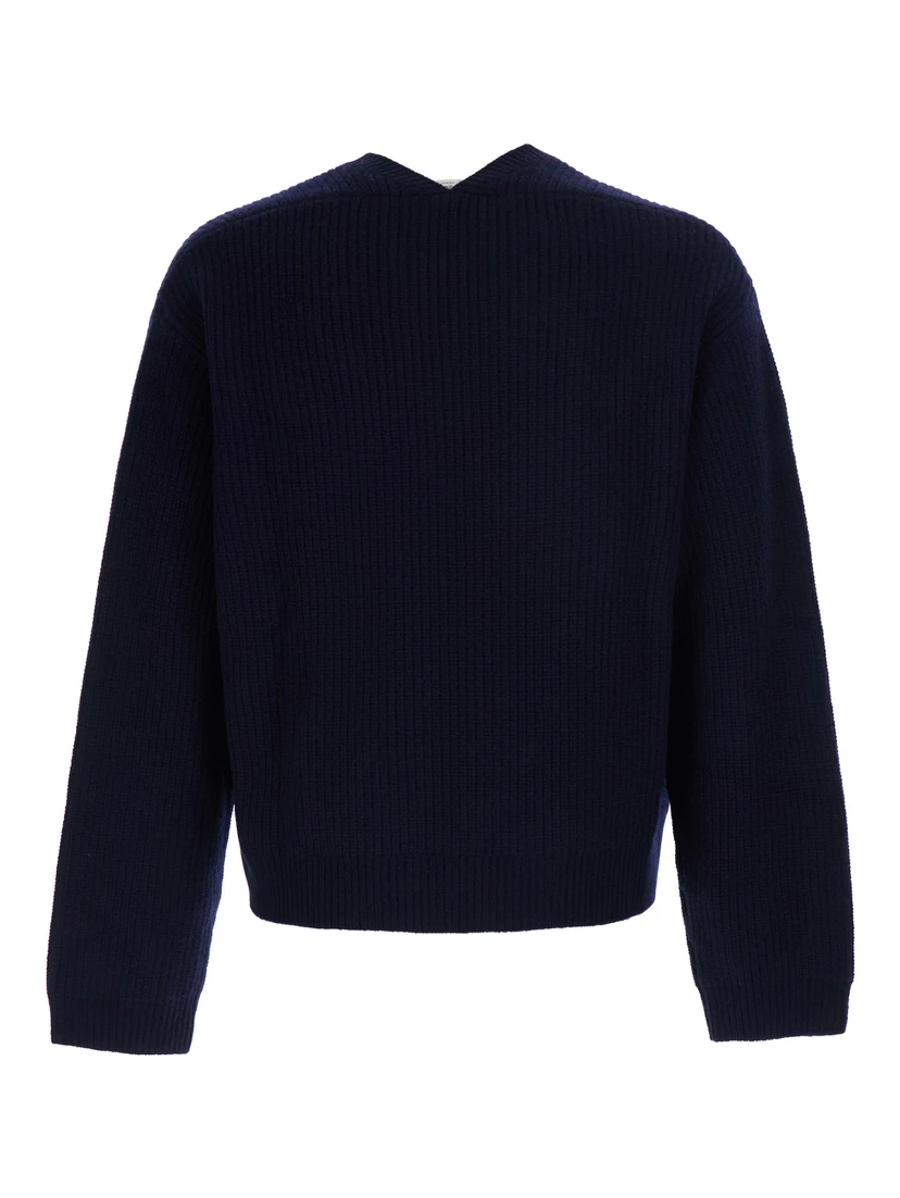 Blue Sweater with round neck and V-neck on the back in ribbed wool for men