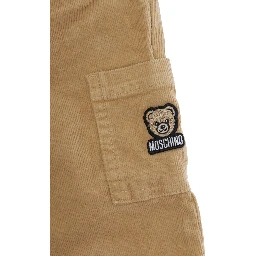 brown trousers with side pocket and logo patch in velvet baby