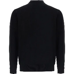POLO NECK MERINO CASHMERE is a sweater with a high collar and long sleeves, made of wool and cashmere, in black, unisex.
