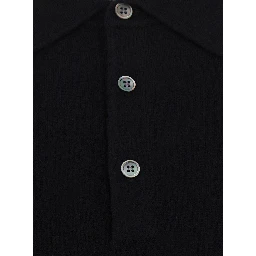 POLO NECK MERINO CASHMERE is a sweater with a high collar and long sleeves, made of wool and cashmere, in black, unisex.