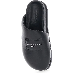 Black Mules with Asymmetrical Design and Padded Leather Logo Women