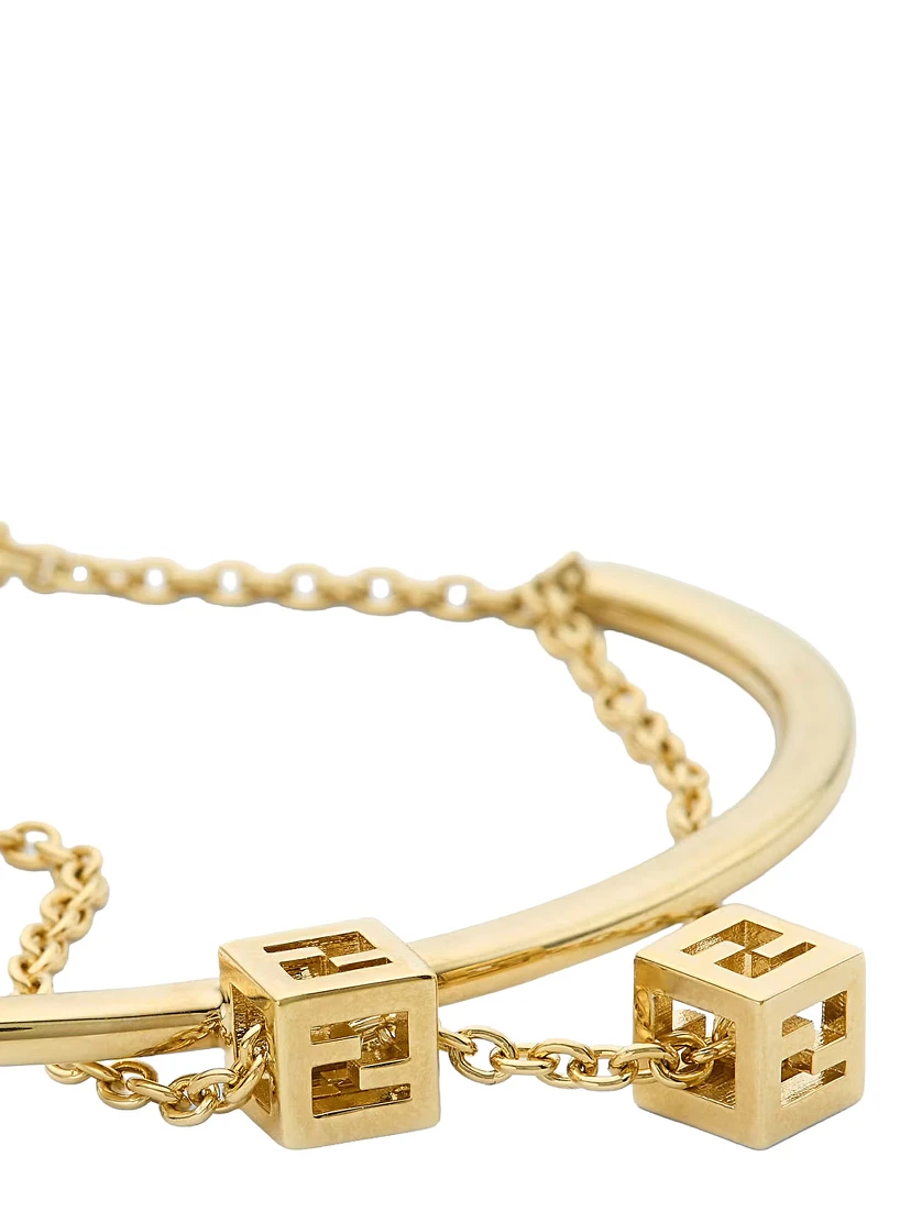 Gold-colored Double bracelet with chain and cube logo in metal for women