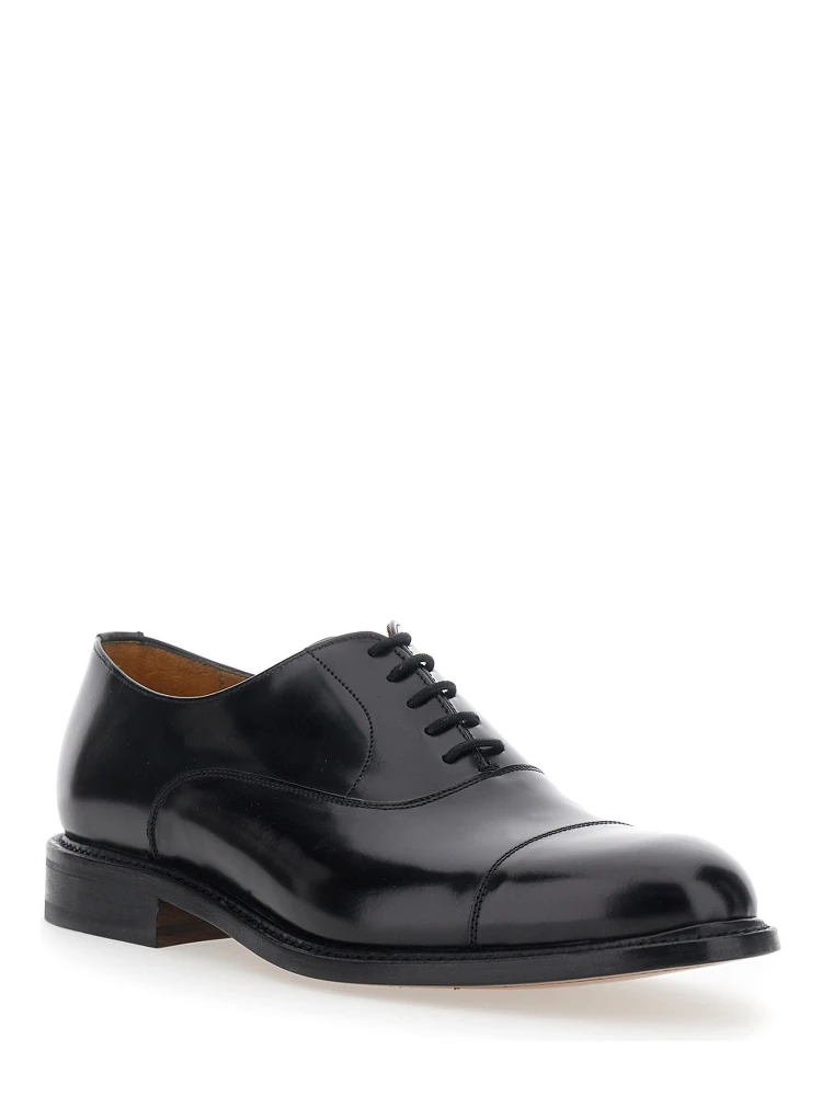 Black lace-up shoes with rounded toe and low heel in leather for men alternative