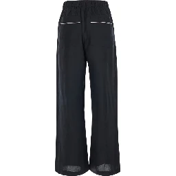 Black pants with waistband and two welt pockets on the back in silk for women