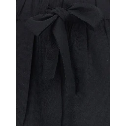 Black pants with waistband and two welt pockets on the back in silk for women