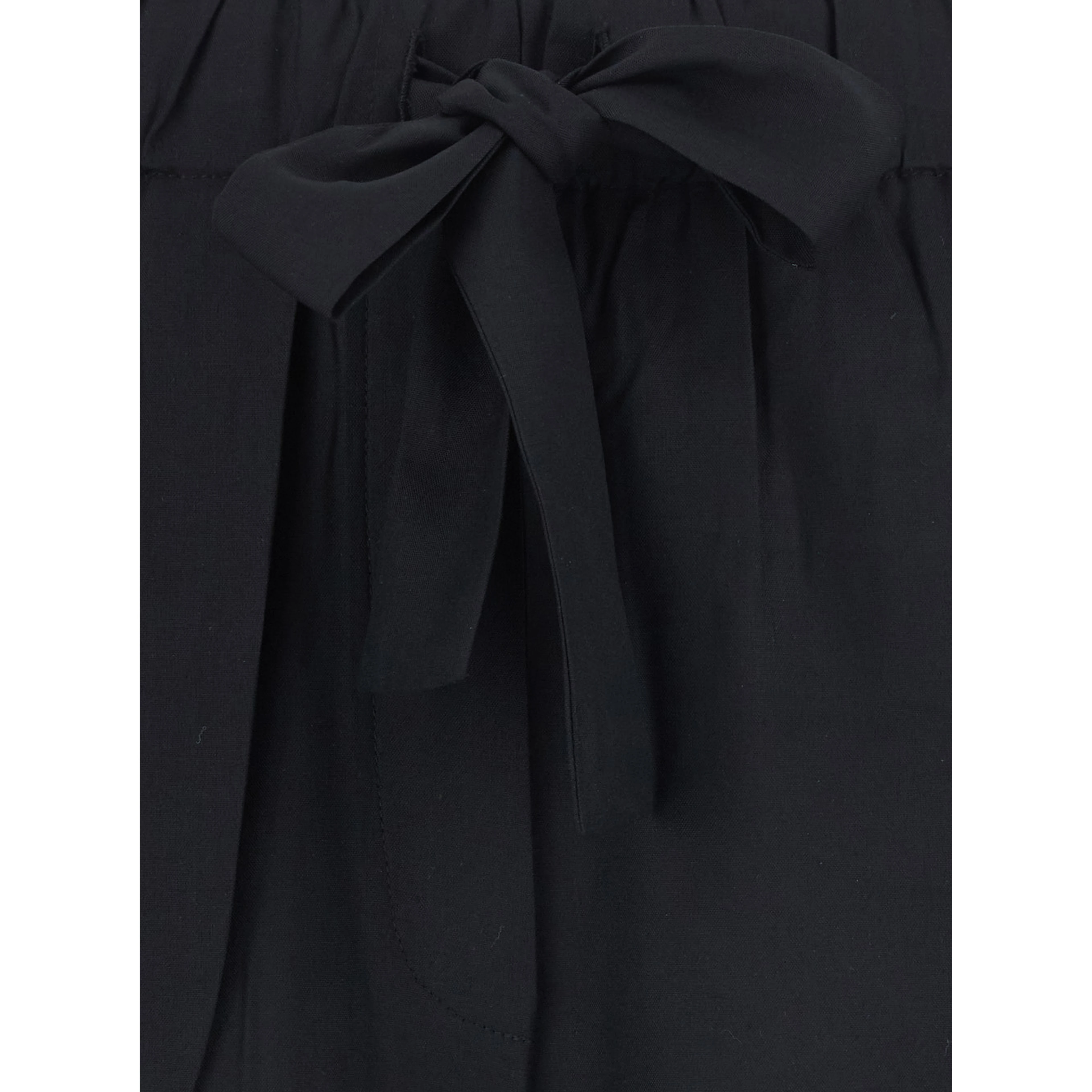 Black pants with waistband and two welt pockets on the back in silk for women