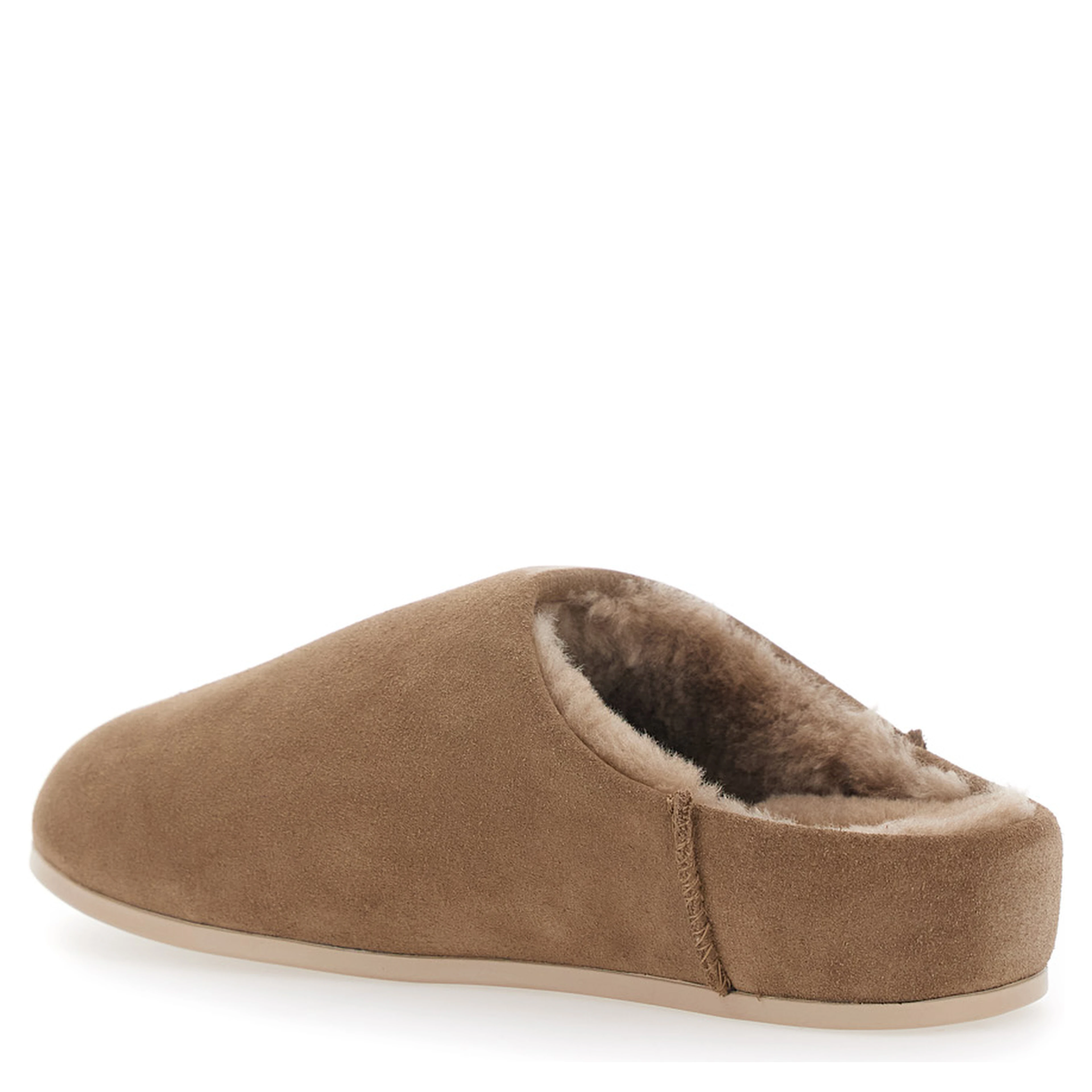 ELEA SLIP ON is a mule with a rubber sole and brown leather upper for women