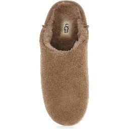 ELEA SLIP ON is a mule with a rubber sole and brown leather upper for women