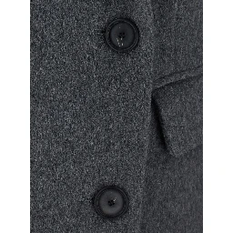 Chloris Coat is a long coat with notched revers and pockets. Made of wool. Gray color. Womens