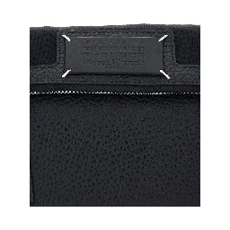 Black Shoulder bag with logo patch on the front and Four Stitches detail on the back in leather for women