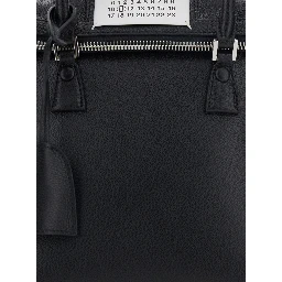 Handbag with applied logo patch and keys on the side in black leather for women