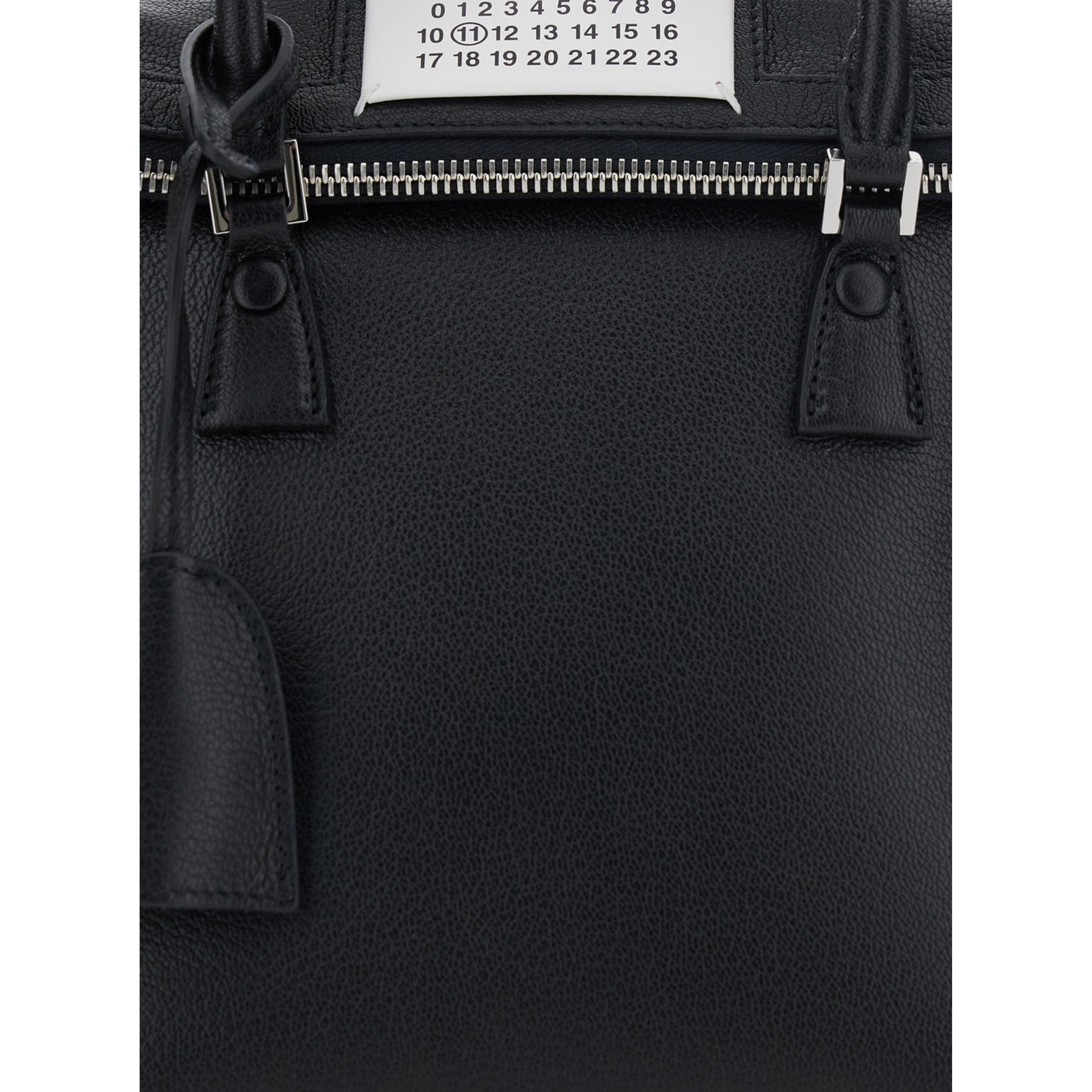 Handbag with applied logo patch and keys on the side in black leather for women