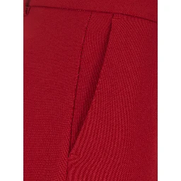 Red High-waisted pants with two welt pockets on the back in fabric for women