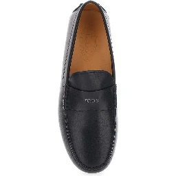 Black loafers with rounded toe and low heel in leather for men