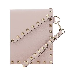 pink Clutch with removable wrist strap and Rockstud decoration in leather for women