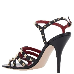 Black Heeled sandals with Rockstud embellishment and high heel in leather for women