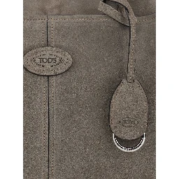 Gray Handbag with embossed logo on the front and adjustable and removable shoulder strap in suede for women