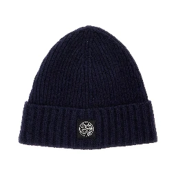 Blue beanie with turn-up brim and logo patch on the front in blend wool boy