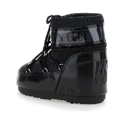 Snow boots with large logo print on the side and flat rubber sole black women