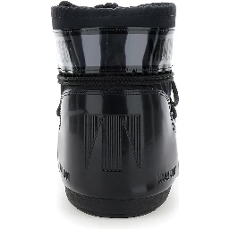 Snow boots with large logo print on the side and flat rubber sole black women