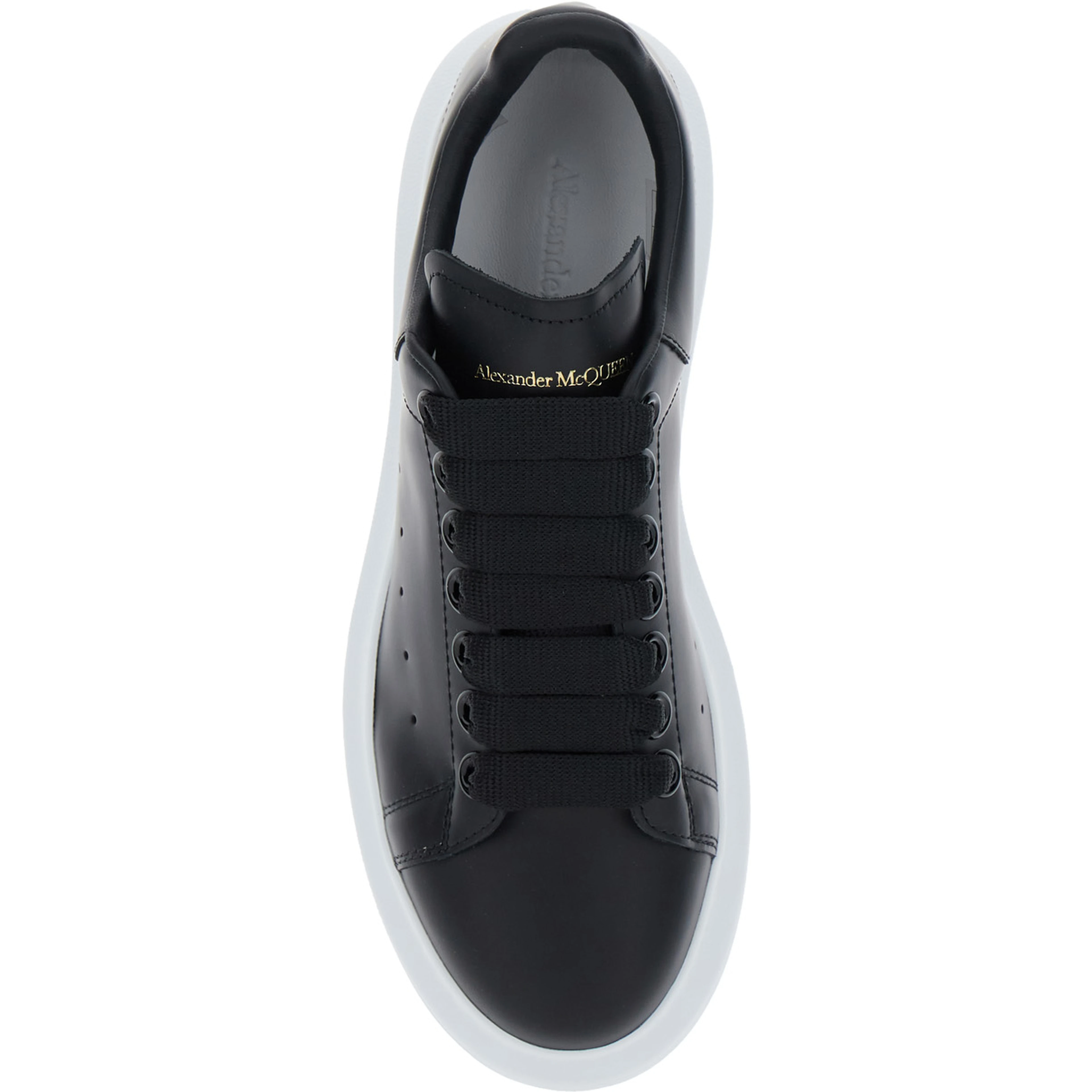Low Top Sneakers Alexander McQueen with logo lettering on tongue and heel in black leather for women