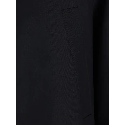Black Parka with fur hood and button closure on the front in cotton for men
