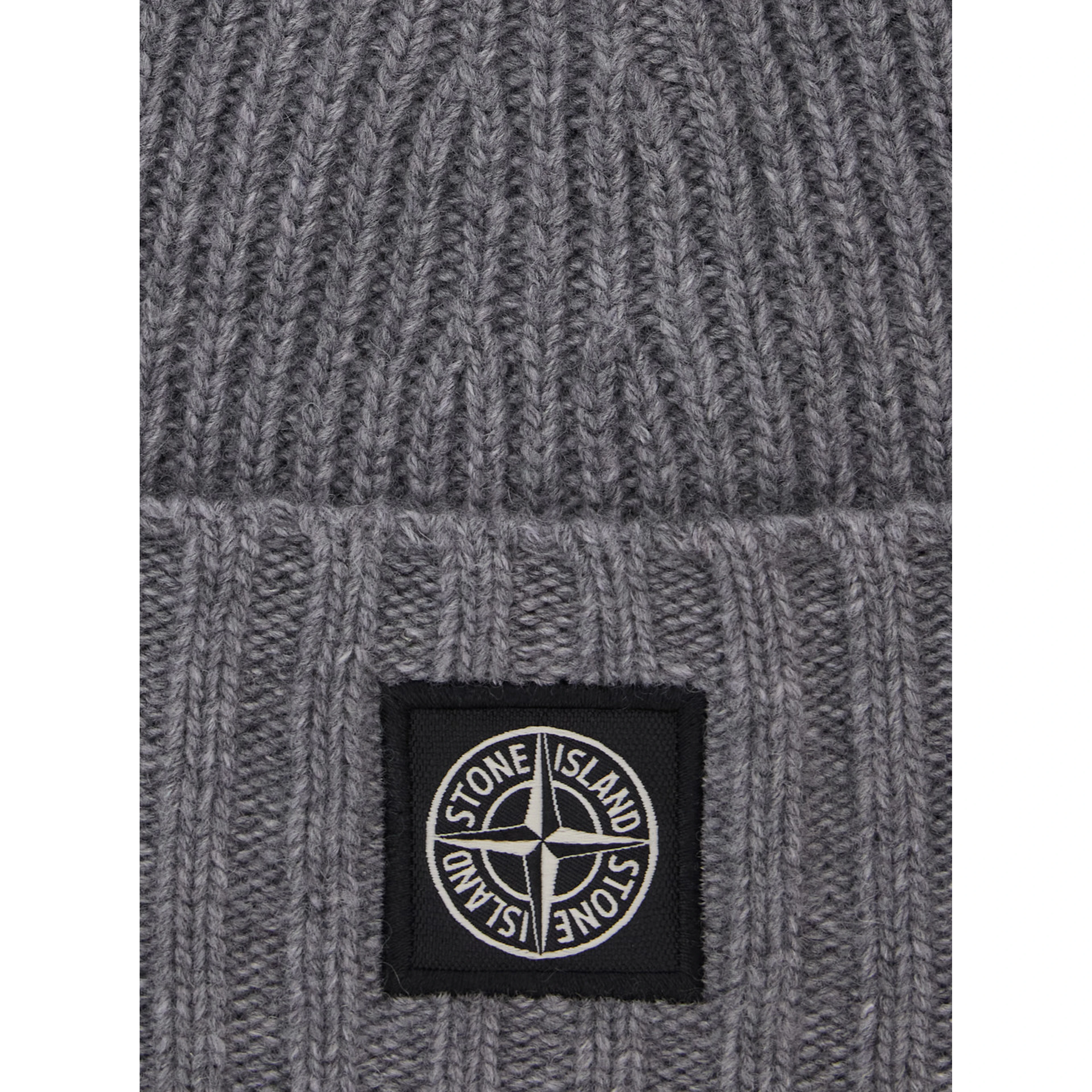 Gray beanie with turn-up brim and logo patch on the front in blend wool boy
