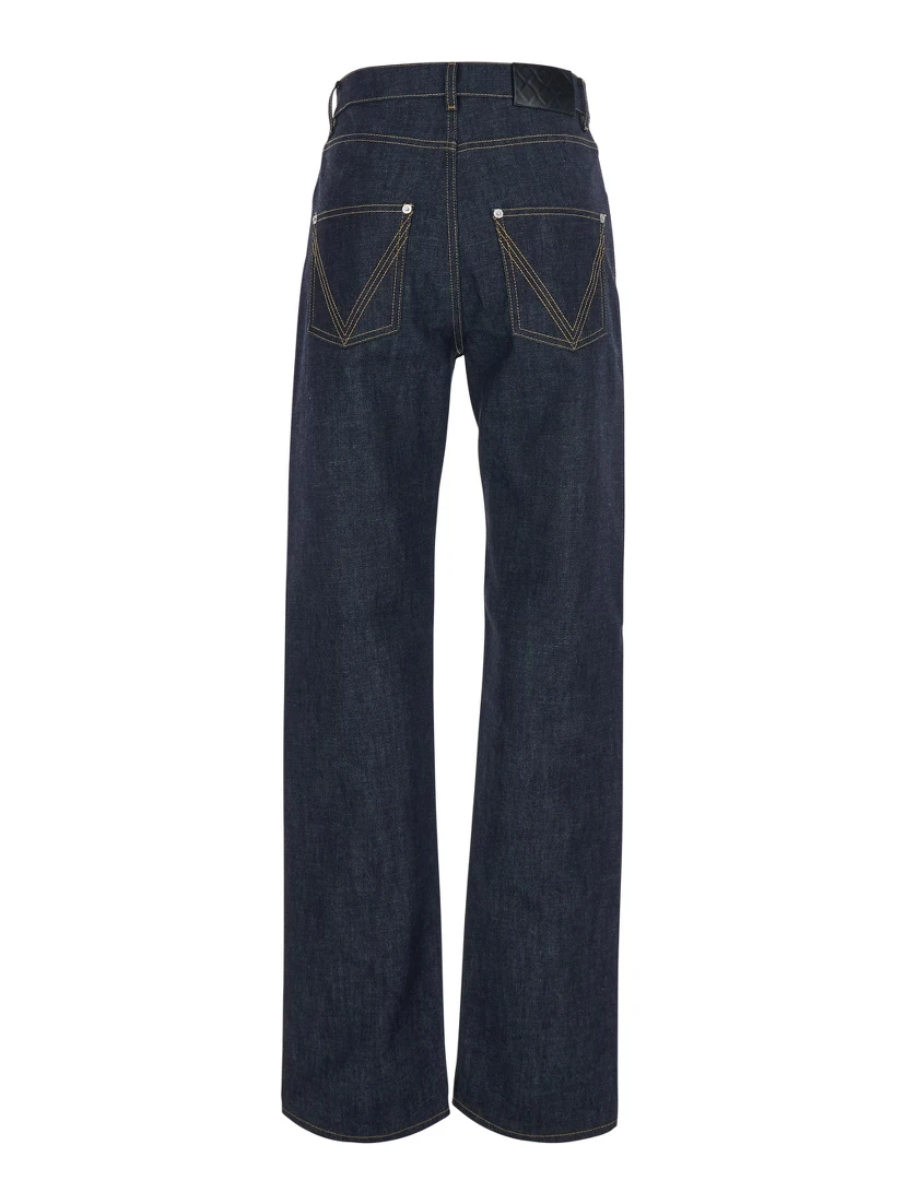 Blue Jeans with contrasting stitching and logo patch on the back in denim for women