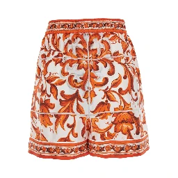 Orange shorts with all-over Maiolica print in silk for women
