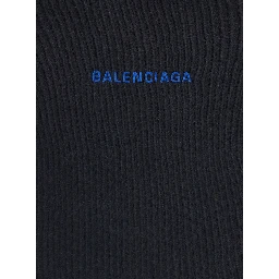 Black hoodie with fixed hood and logo lettering on the front and back in cotton men