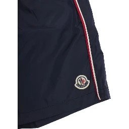 Blue Swim shorts with logo patch on the front and striped details on the side in Tech Fabric Boy