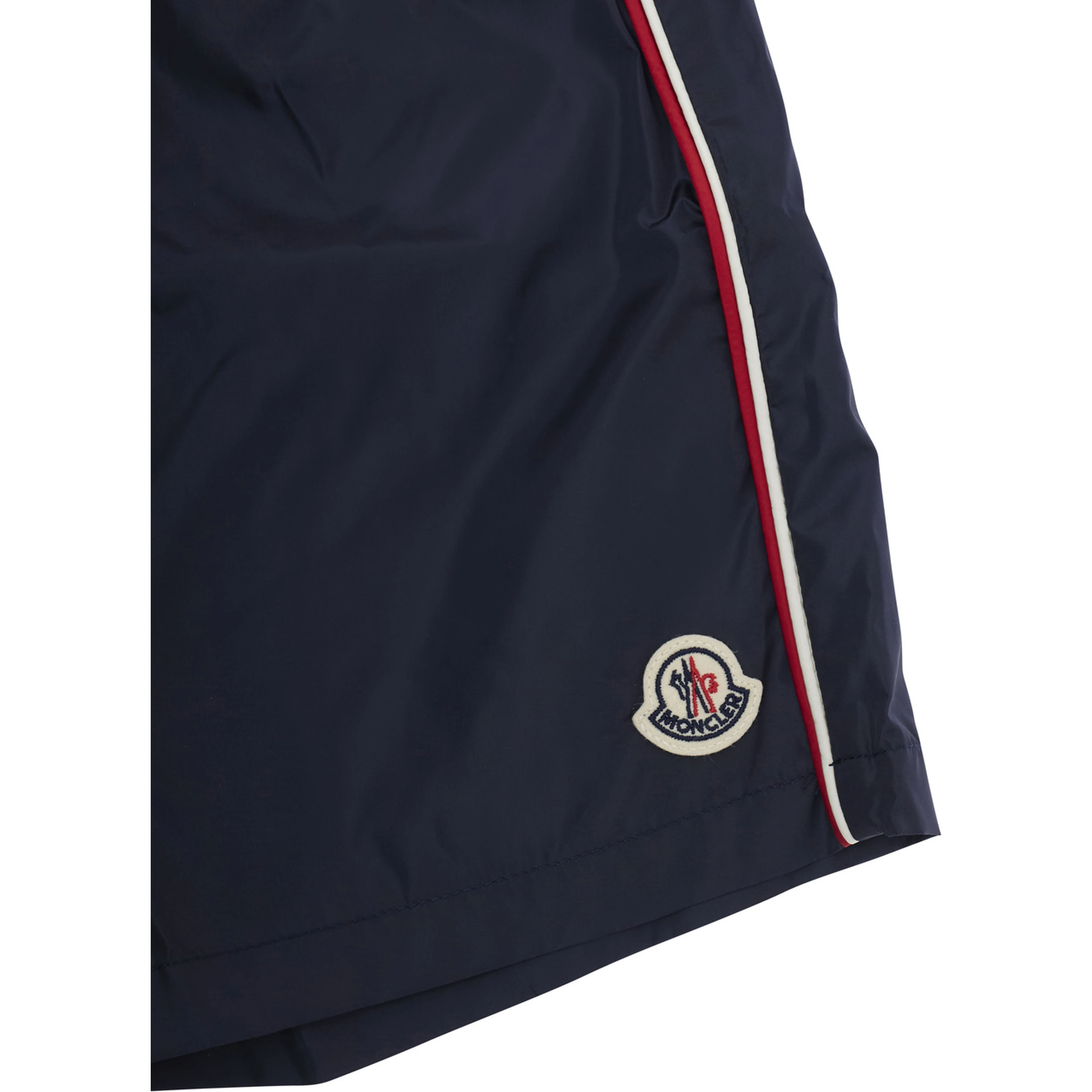 Blue Swim shorts with logo patch on the front and striped details on the side in Tech Fabric Boy