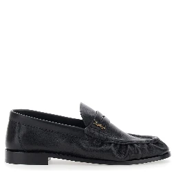 Le Loafer Black Loafers with rounded toe and Cassandre plate in Leather for Women