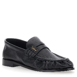 Le Loafer Black Loafers with rounded toe and Cassandre plate in Leather for Women