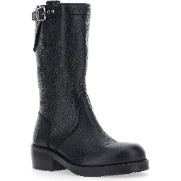 Black boots with decorative buckle and low heel in leather for women